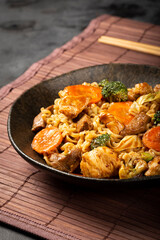 Yakisoba noodles. Yakisoba dish with meat, chicken and vegetables.