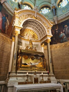 The body of Saint John Mary Vianney, entombed above the main altar in the Basilica at Ars, France. 