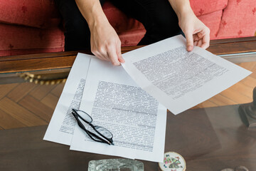 Woman reviewing a the text of a contract