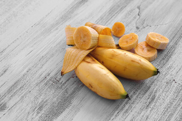 Barlin Banana on a white wood table 