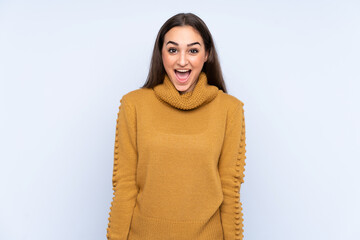 Fototapeta premium Young caucasian woman isolated on blue background with surprise facial expression