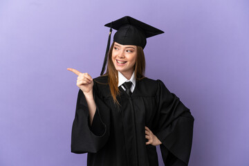 Young university graduate over isolated purple background intending to realizes the solution while lifting a finger up