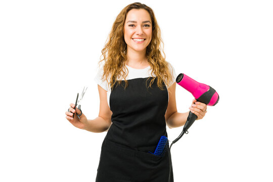 Beauty Stylist Blow Drying And Cutting The Hair Of A Customer