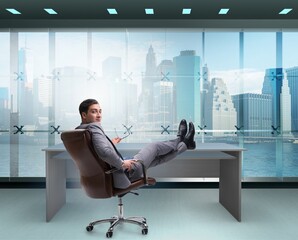 Fototapeta premium Young male businessman enjoying his time during vacation