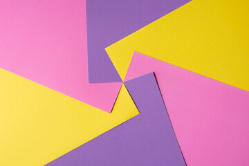 Colored papers in an abstract background 