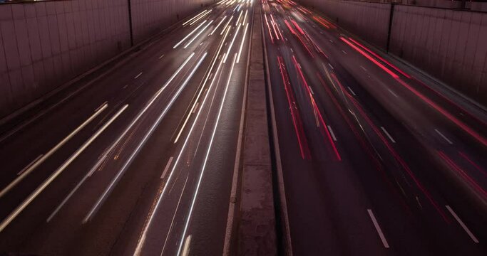 Traffic on the city highway. Time lapse of night light trails. Moscow traffic