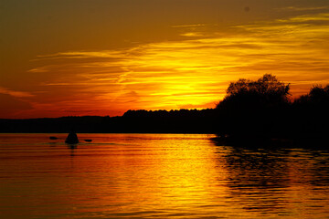 Fototapeta na wymiar Kayaking at Sunset