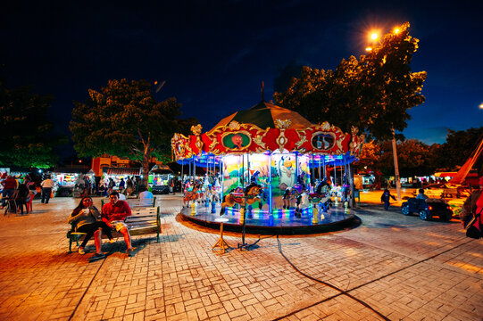Parque de las Palapas, cancun, mexico - june, 2019 square carousel