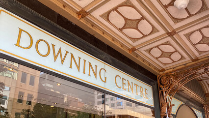 Signage outside the Downing Centre. State government courts, including Local Court, District Court, and a law library. Department of Justice and sheriffs offices