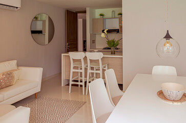 Cozy dining room for a small family with the kitchen near the living room.