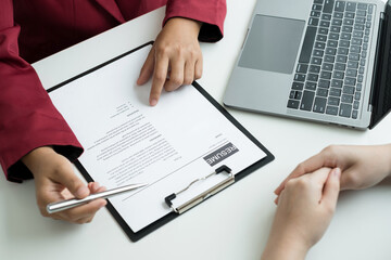 Business people hold a resume and talk to job applicants for job interviews about careers and Their personal history in the company. Recruitment concepts