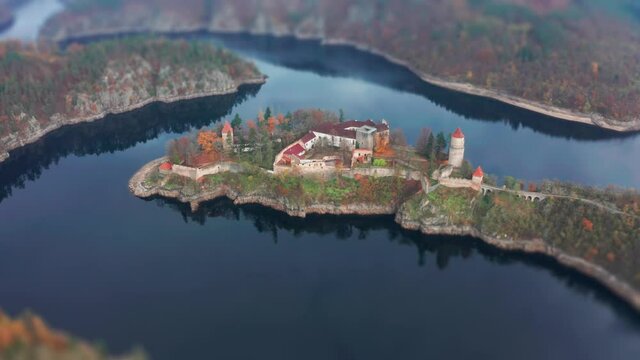 A tilt-shist video. Hrad Zvikov - a beautiful medieval castle standing on the rocky peninsula on one of the turns of the Vltava river. Overlooking the wide river and the forest.