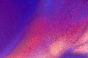 Beautiful bright colorful street art graffiti background. Abstract creative spray drawing fashion colors on the brick walls of the city. Urban Culture gradient texture, backdrop