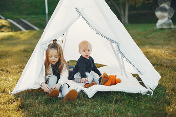 Family in a park playing on a grass © prostooleh