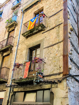 Ancient building with balconies in Girona, Spain
