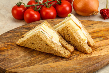Club sandwich with chicken and cheese