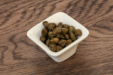 Tasty capers in the bowl
