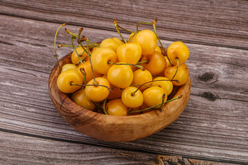 Sweet ripe yellow cherry heap
