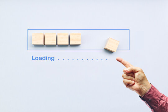 Pointing progress bar filling with wooden cubes. Loading status