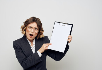 Puzzled woman with documents in hands job office mockup