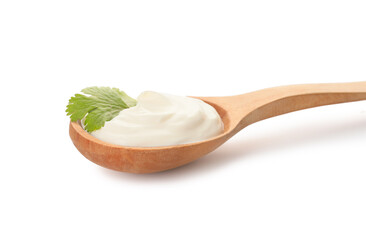 Spoon with tasty sour cream on white background