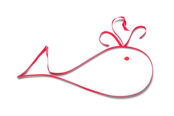 Whale made of red ribbon on white background
