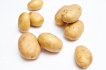 Fototapeta na wymiar fresh washed potatoes on white background