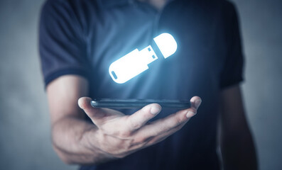 Man holding Usb flash drive.