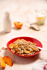 Breakfast cereal, in red bowl