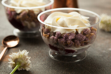 beautiful white cream dessert in a transparent glass.
tiramisu in a transparent glass.