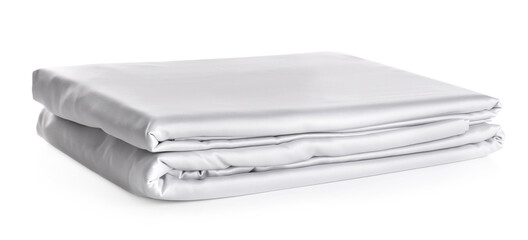 Stack of clean silky bed linen isolated on white