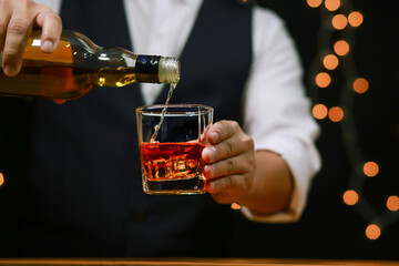 Bartender Serve Whiskey, on wood bar, 