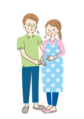 妊娠中の女性が心配し、夫が寄り添う