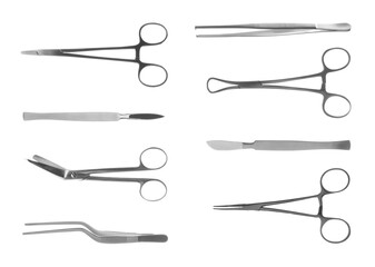 Set with different surgical instruments on white background