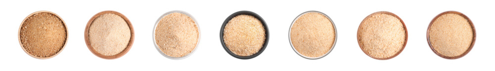 Set with fresh bread crumbs on white background, top view. Banner design