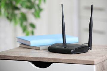 Modern Wi-Fi router indoors. Space for text - obrazy, fototapety, plakaty