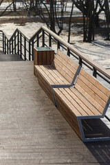 Smooth wooden descent to the river in Kapotna. Multi-level smooth descent. Wooden benches on a...
