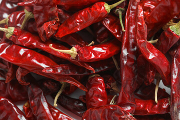 Dried red chilli on white background.