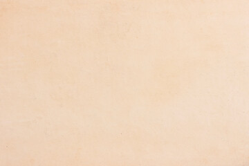 A sheet of old, stained, yellowed paper. Neutral light texture.
