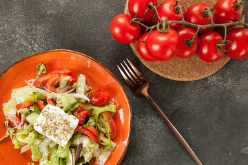 salad with vegetables and cheese with Caesar sauce