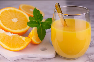 Fresh orange juice in a glass.
Close-up.