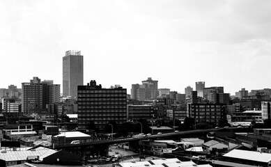 Naklejka premium JOHANNESBURG, SOUTH AFRICA - Mar 13, 2021: View of Johannesburg Central Business District buildings and lan