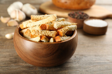 Delicious hard chucks in bowl on wooden table