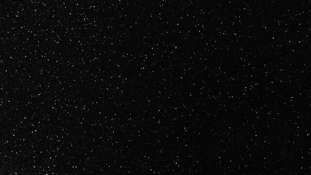 twinkling star particles animation in starry night background. sparkle star light in sky. flickering particles in the dark.
