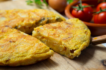 Shooting audiovisual content Traditional spanish omelette with potatoes and onion.