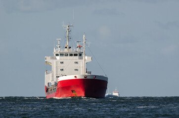 MERCHANT VESSEL - Red ship on a cruise at sea