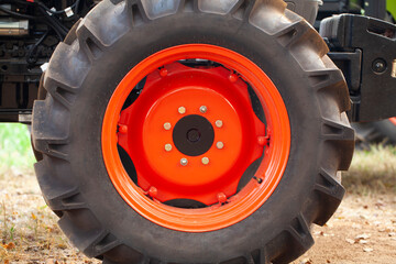 close up of tractor tire in a farm, agriculture concpet.