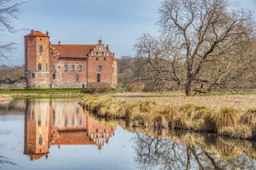 Obraz premium Prosperous countryside estate or manor (Torups Slott) conveys the concept of ancient viscountcy or earldom. Ancient Swedish or Nordic mansion (Torup Castle) provides an historical barony illustration