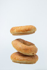 Sweet donuts on a white background. Isolated sweetness on a light background. Sweet bagels