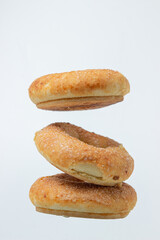 Sweet donuts on a white background. Isolated sweetness on a light background. Sweet bagels